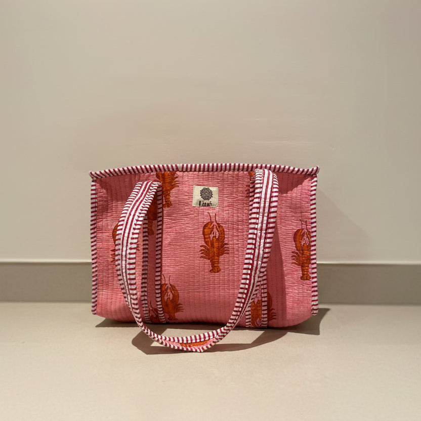 Midi draagtas roze 🦞