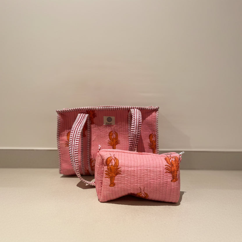 Midi draagtas roze 🦞